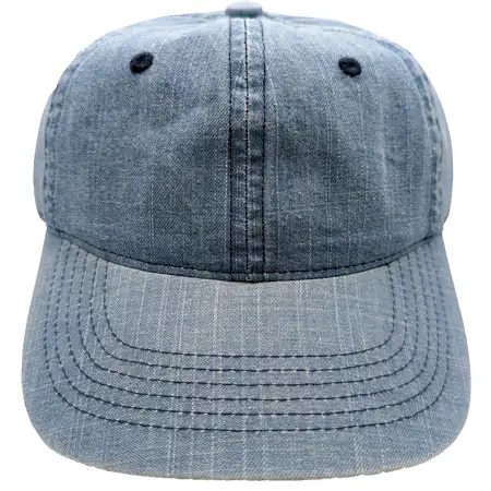 Photo of a cap that has been put through a distressed wash, with some general weathering and fading throughout